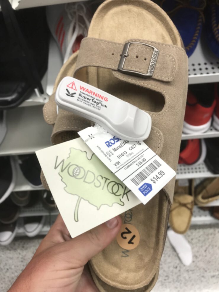 Sandal covered in tags.